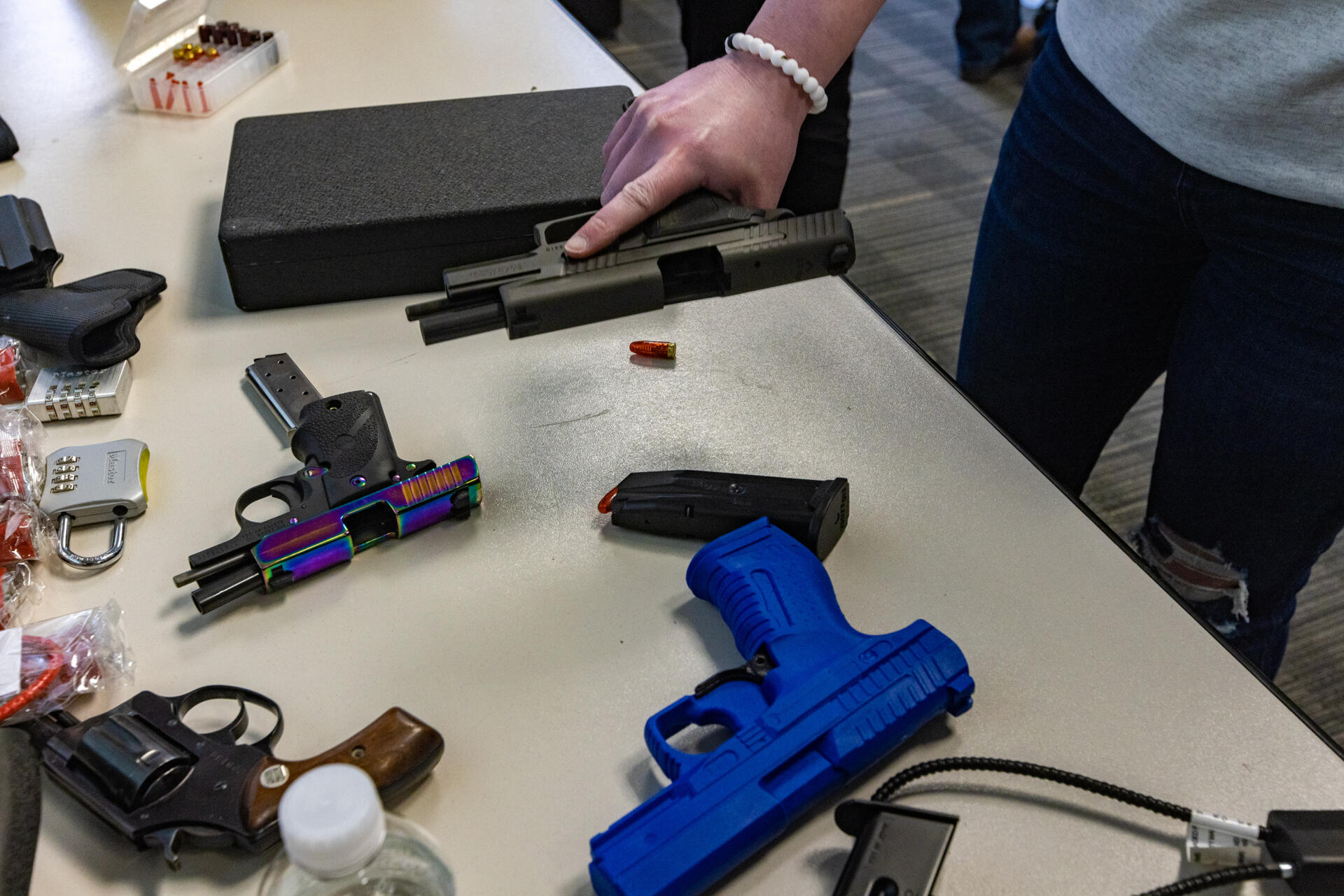 Massachusetts State House with protest signs against new gun control laws