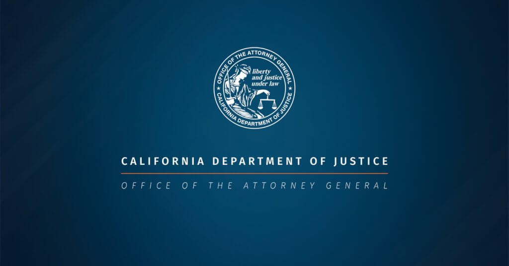 California firearms dealer and staff seated in a DOJ-mandated annual training classroom with instructor at front