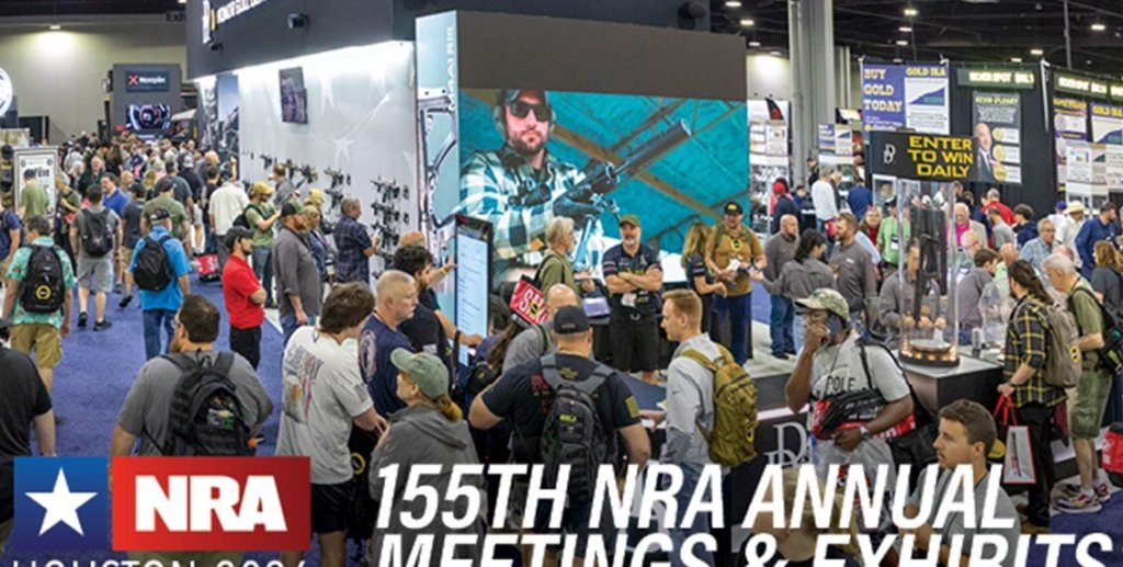Booths packed with new firearms, suppressors, optics, and accessories at the NRA 2026 Exhibits in Houston.
