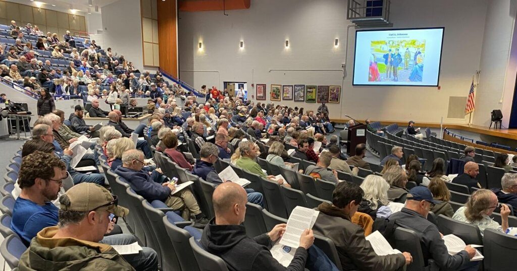 Crowd at Sandwich Massachusetts town hall meeting debating concealed carry in public buildings