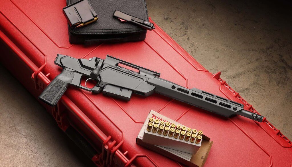 Close-up of the Model 2020 Heatseeker Pistol's adjustable carbon fiber cheek riser, M-LOK slots, and AR-15 compatible controls