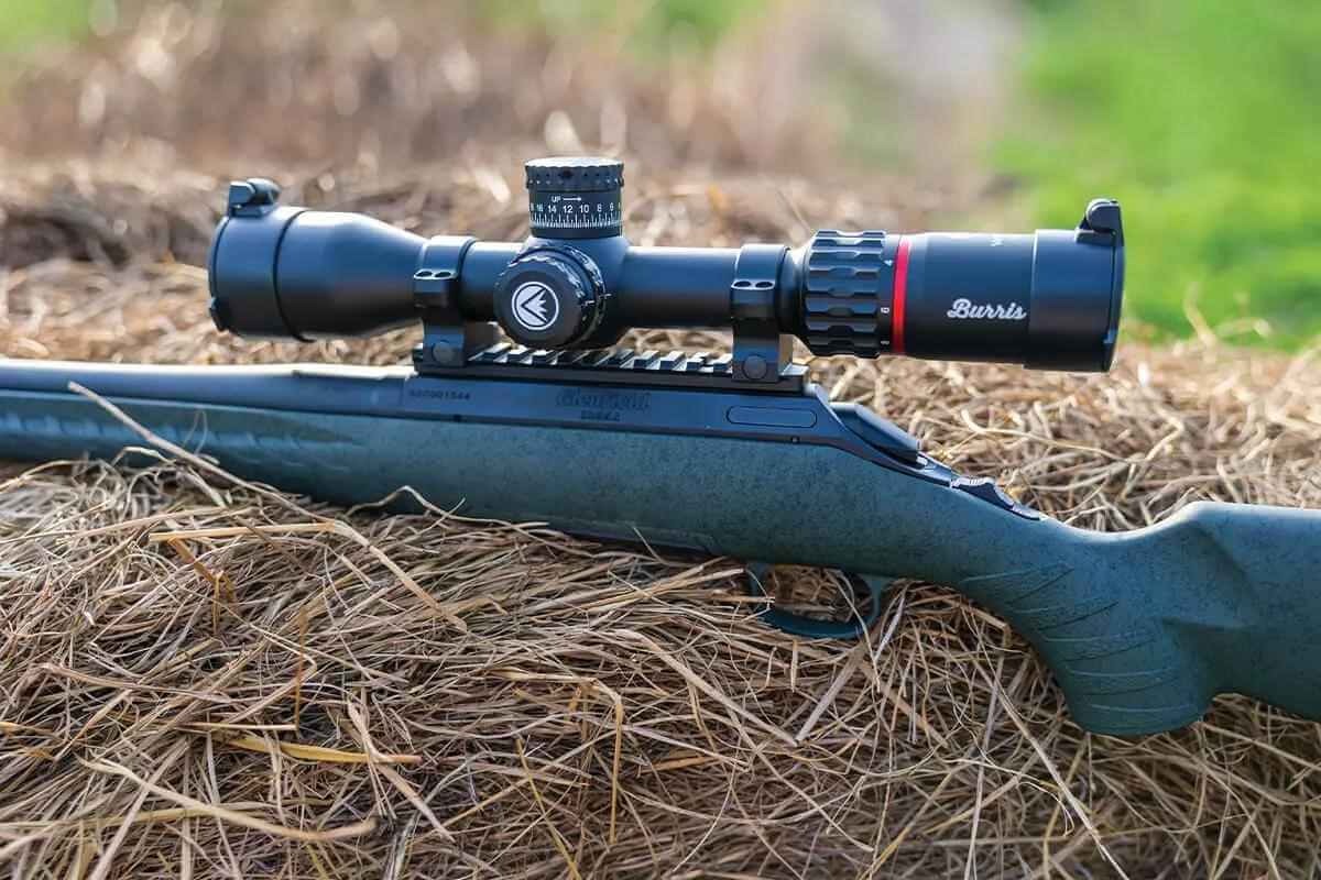 Close-up of Glenfield Model A adjustable trigger and Moss Green Splatter synthetic stock, highlighting durability and customization features