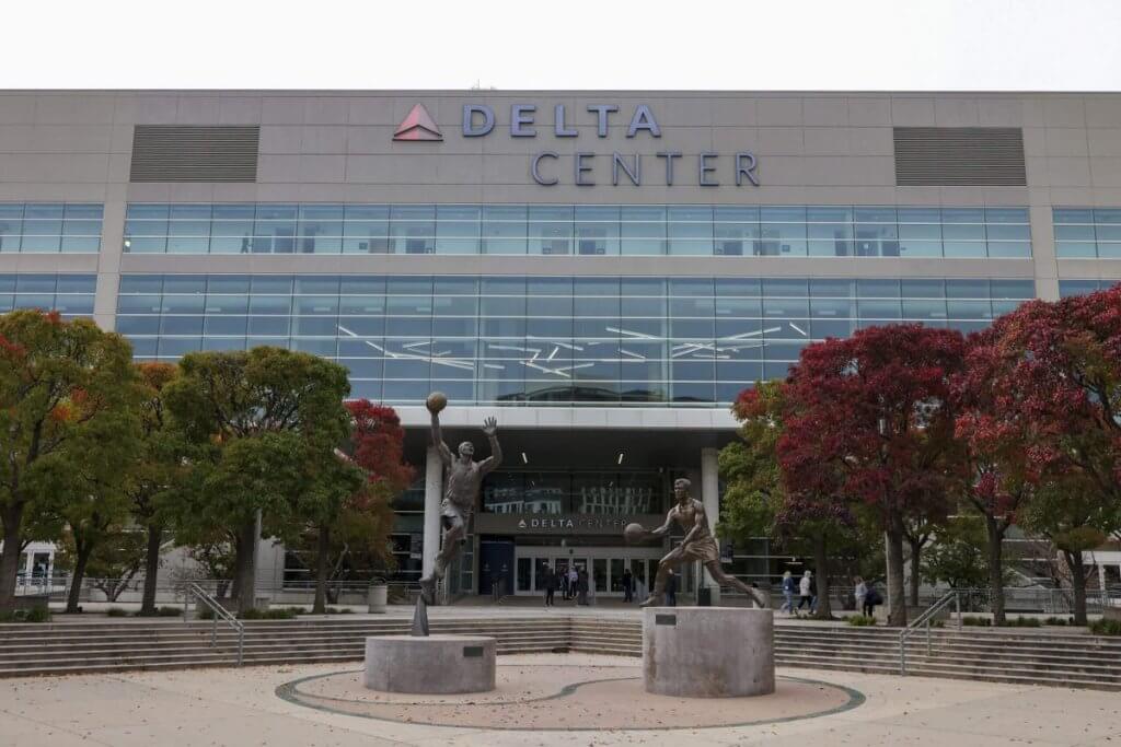 Exterior view of the Delta Center in Salt Lake City with subtle Second Amendment signage elements