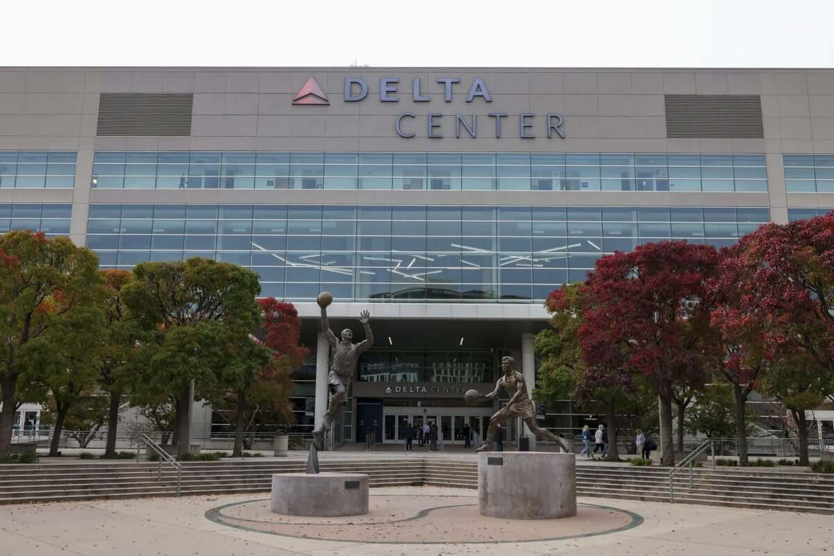 Exterior view of the Delta Center in Salt Lake City with subtle Second Amendment signage elements